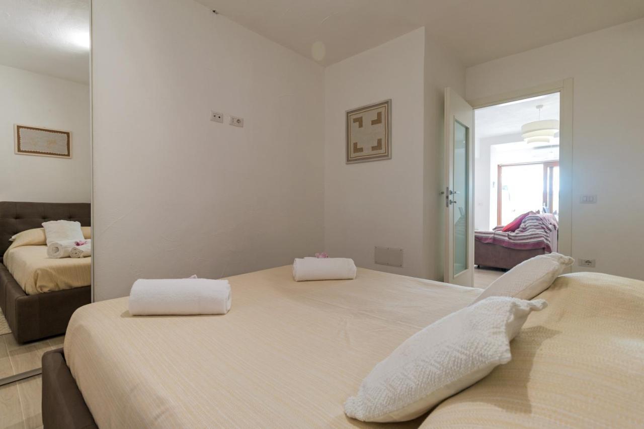Purple Flower Suite Apartment Кала Гононе Екстериор снимка