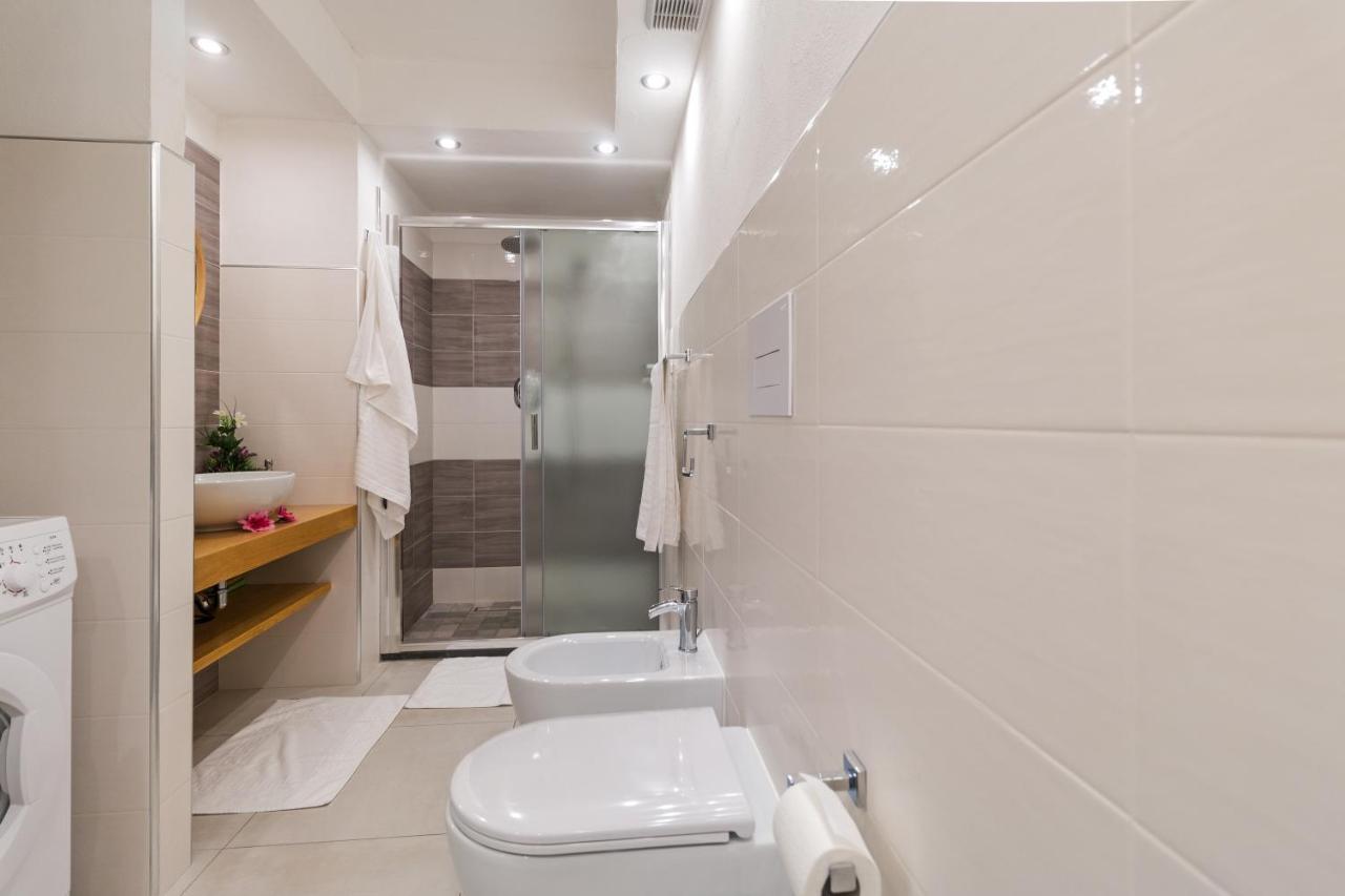 Purple Flower Suite Apartment Кала Гононе Екстериор снимка